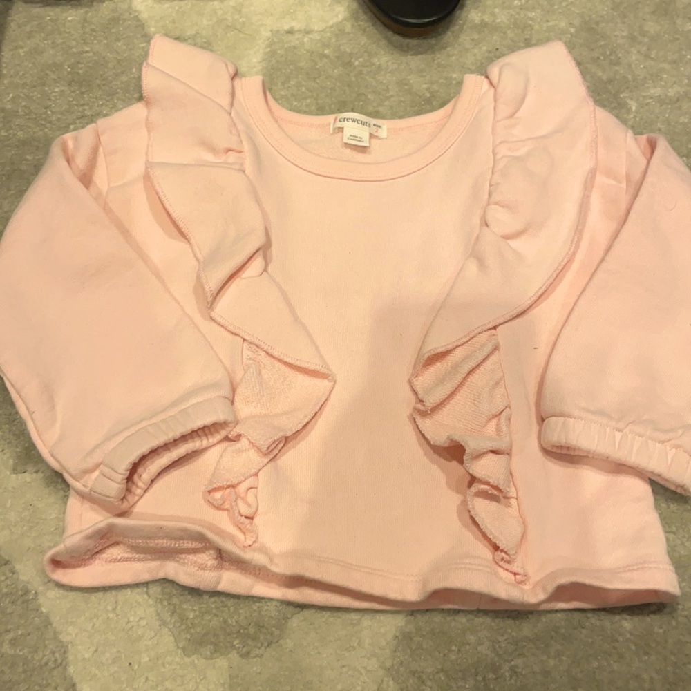 light pink sweater